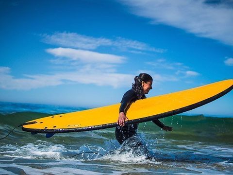 Participate in a surf course during your yoga holiday